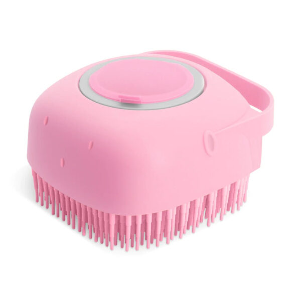 pink shampoo brush showing with white background