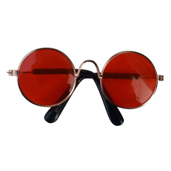 gold frame glasses with red lenses