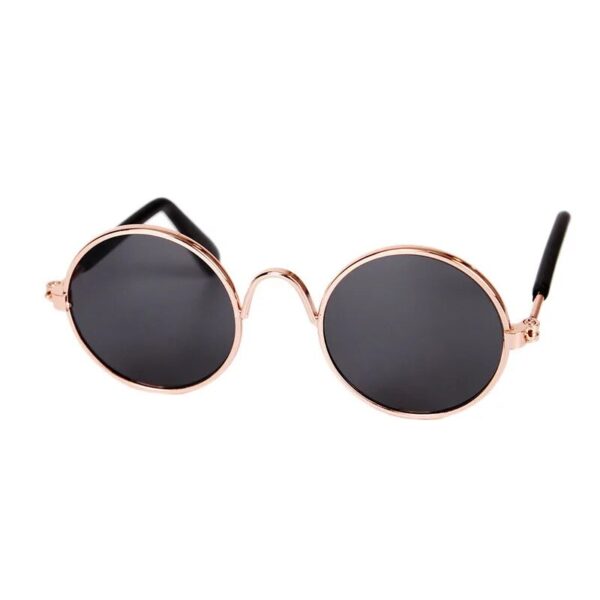 gold framed black shaded cat glasses