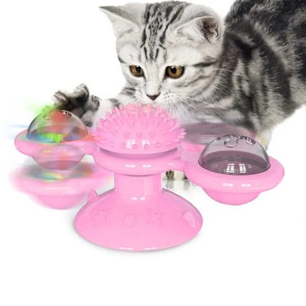 pink vibrating pet toy with snack containers