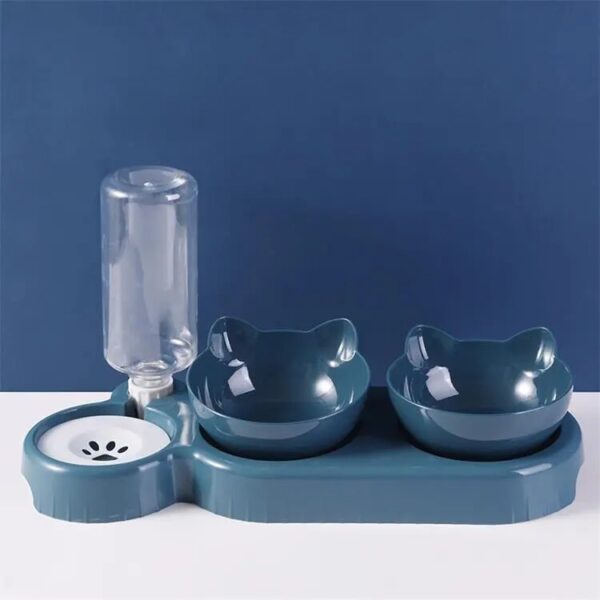 blueish automatic water feeder with two food bowls